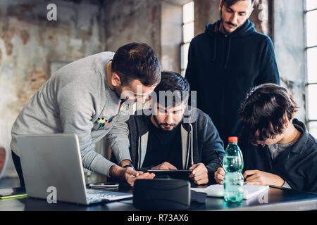 Designers brainstorming in studio Stock Photo
