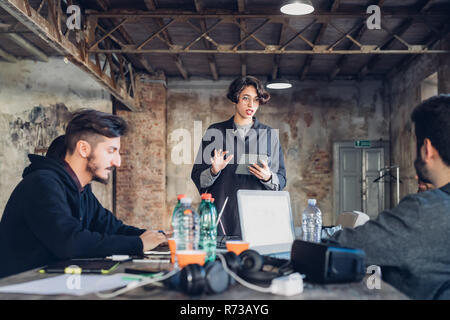 Designers having meeting in studio Stock Photo