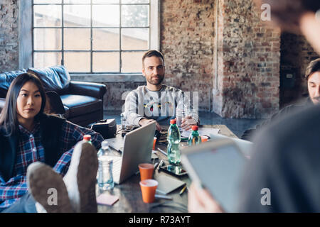 Designers having meeting in studio Stock Photo