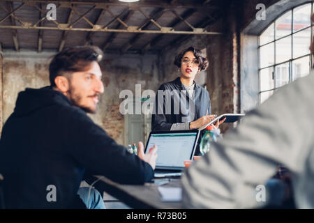 Designers having meeting in studio Stock Photo