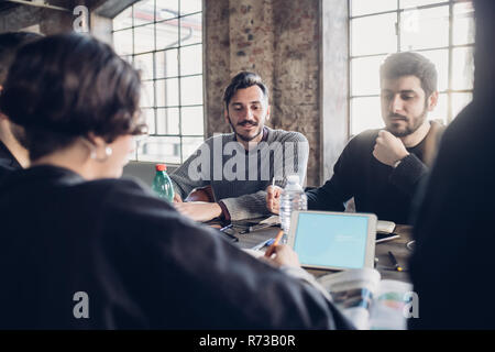 Designers having meeting in studio Stock Photo