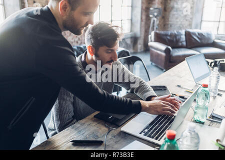 Designers brainstorming in studio Stock Photo