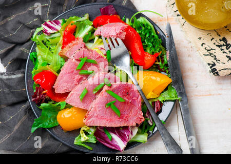 Seared Tuna Steaks with Greens. selective focus Stock Photo