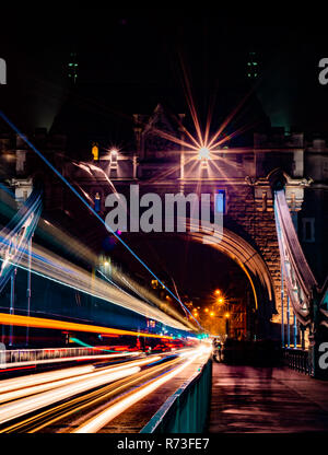 Night Trails from traffic on Tower Bridge, City of London. Stock Photo