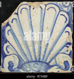 Tile of chimney pilaster, blue on white, shell-like white headdress, chimney pilaster tile pilaster footage fragment ceramics pottery glaze, baked 2x glazed painted number 12. Stock Photo