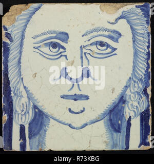 Tile of chimney pilaster, blue on white, head of woman with long curly hair, chimney pilaster tile pilaster footage fragment ceramic pottery glaze, the number 11 below. Stock Photo
