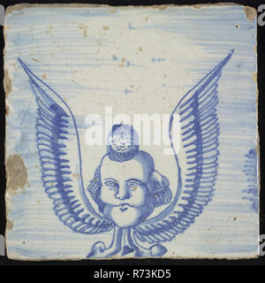 Tile of chimney pilaster, blue on white, in striped air cherub with long wings, chimney pilaster tile pilaster footage fragment ceramic earthenware glaze, baked 2x glazed painted Stock Photo
