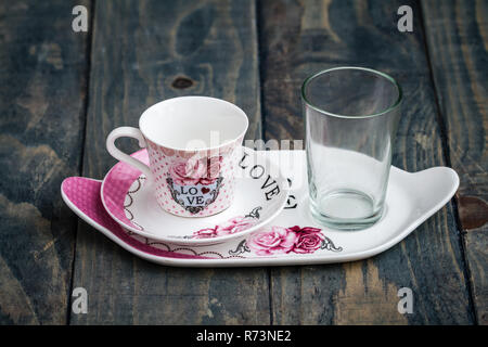 Classic Porcelain Turkish Coffee Cup with Tray and Glass Stock Photo