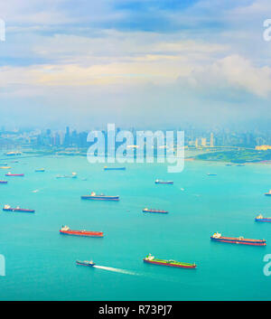 Shipping tankers in Singapore harbor Stock Photo