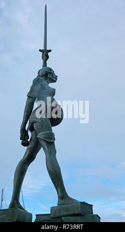 ILFRACOMBE, ENGLAND - DECEMBER 15, 2016: The 20 meter tall steel and bronze statue, known as Verity and symbolizing Truth, designed by Damien Hirst Stock Photo