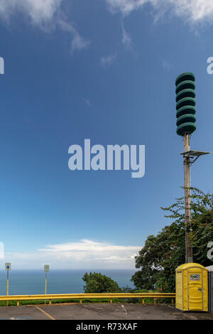 Kukuihaele, Hawaii - A tsunami warning siren above the Waipi'o Valley on the Big Island of Hawaii. A devastating tsunami struck the valley in 1946. Stock Photo