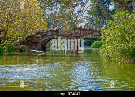 Rock bridges cross over Stow Lake in the Golden Gate park of San Francisco, California. Stock Photo