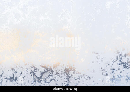 Ice pattern on the frosty window. Beautiful winter background. Stock Photo
