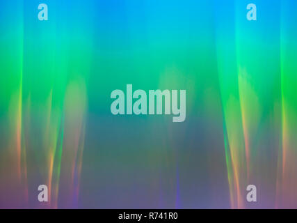 Light dispersion from a compact disk surface. Rainbow effect. Stock Photo