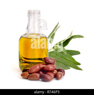 Marinated olives with oil. Isolated on white background. Stock Photo