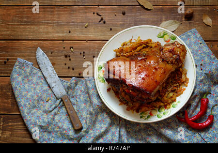 Eisbeinwith stewed cabbage: Pork leg done the German way Stock Photo