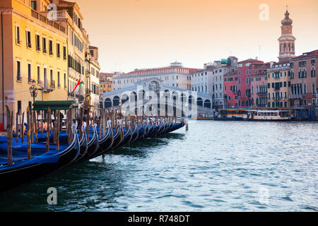 Gondolas on Grand canal near Rialto bridge, Venice, Veneto, Italy Stock Photo