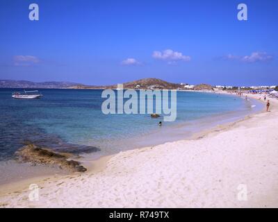 Sand on Beach and Turquoise Sea Water on Naxos Island in Greece Stock Photo