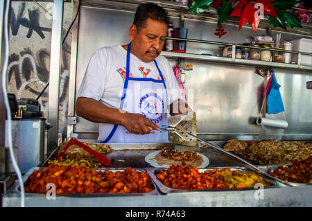 A burrito being prepared at a street food stall in Mexico City, Mexico Stock Photo