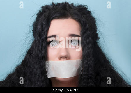 Young woman in the censorship concept Stock Photo - Alamy