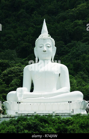 White Buddha statue on the hill Stock Photo