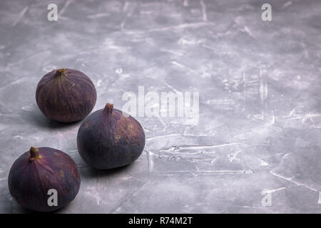 Fresh figs on a concrete background, top view. Close-up. insulator Stock Photo