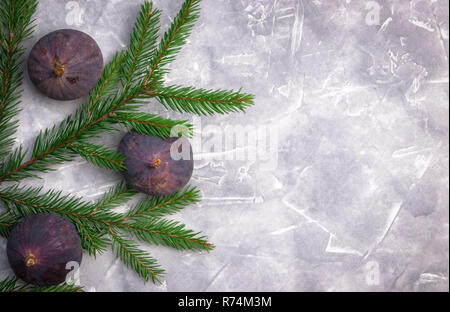 Fresh figs on a concrete background, top view. Close-up. insulator Stock Photo