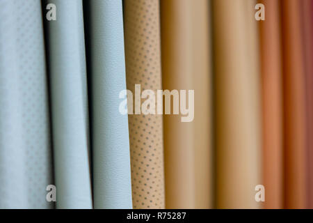 Crafting tools on natural cow leather in the tailoring workshop. Stock Photo