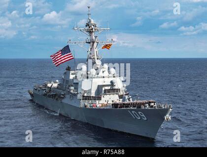 U.S. sailors aboard the Arleigh-Burke class guided-missile destroyer USS Jason Dunham pose on the foredeck for a command photo during routine patrol in the Mediterreanean Sea December 2, 2018 off the coast of Spain. Stock Photo