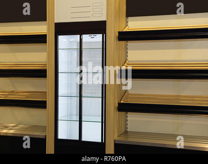 Empty Wooden Shelf for Bread and Display Fridge in Bakery Stock Photo