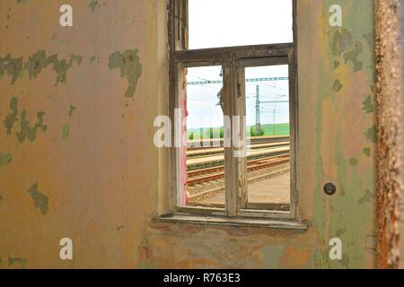 Devastated room. Destroyed squat. Derelict home. Homeless living Stock Photo