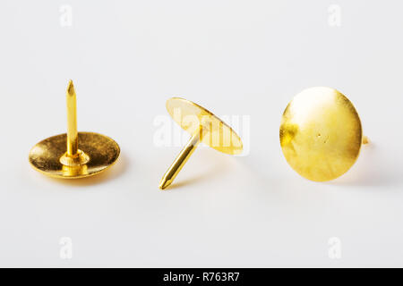 Closeup metal tacks on a white. Office concept Stock Photo