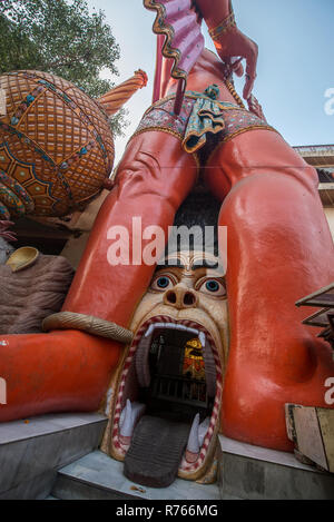 Entrance in a shape of an open mouth at Jhandewalan Hanuman Temple, New Delhi, India Stock Photo