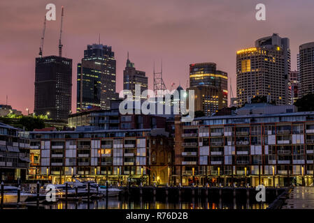 Luxury apartments on Sydney Harbour our at dawn - Sydney City in the background