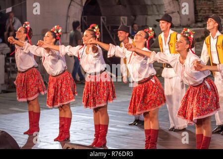 PLOVDIV, BULGARIA - AUGUST 06, 2015 - 21-st international folklore festival in Plovdiv, Bulgaria. The folklore group from Serbia dressed in traditiona Stock Photo