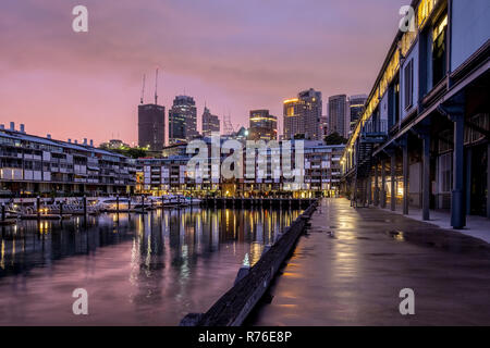 Luxury apartments on Sydney Harbour our at dawn - Sydney City in the background Luxury apartments on Sydney Harbour our at dawn - Sydney City in the background