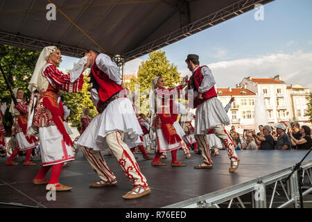 PLOVDIV, BULGARIA - AUGUST 06, 2015 - 21-st international folklore festival in Plovdiv, Bulgaria. The folklore group from Bulgaria dressed in traditio Stock Photo