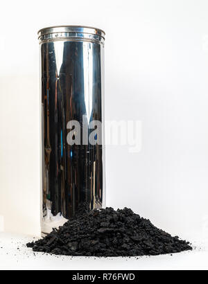 Insulated Wood Stove Chimney Pipe with Dangerous Accumulation of Creosote on a white background. Stock Photo