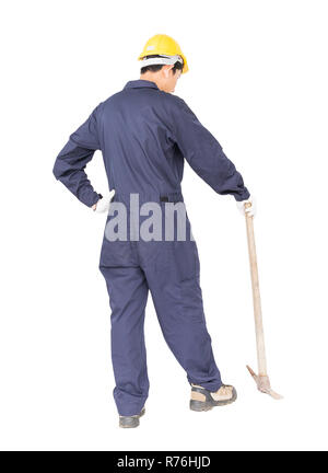 Man in uniform hold old pick mattock that is a mining device Stock Photo