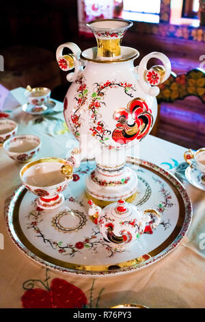 Russian Tea Ceremony with Samovar standing on the Table Stock Photo