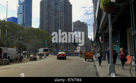 Walking through the streets of New York, Manhattan. The life of New York in the afternoon. Streets and city buildings. Stock Photo