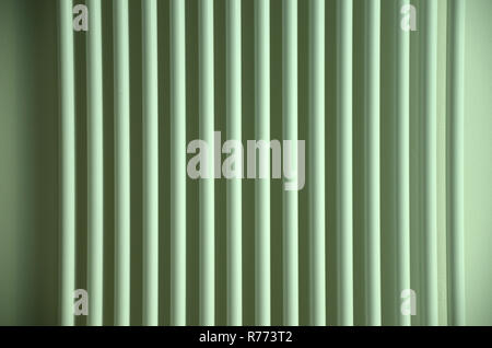 Parallel lines of a metal heating body Stock Photo