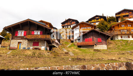 Traditional houses in Bettmeralp village in Swiss Alps Stock Photo