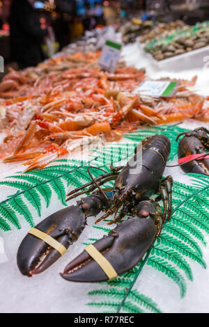 Fresh seafoods at the Mercat de Sant Josep de la Boqueria, a large public market in the Ciutat Vella district in Barcelona, Spain. Stock Photo