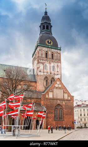 Flags is front of the Dom church in Riga, Latvia Stock Photo