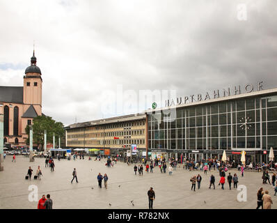 Church of St. Mary Ascension (St. Maria Himmelfahrt) and Main railway station (Hauptbahnhof) in Cologne (Koln). Germany Stock Photo