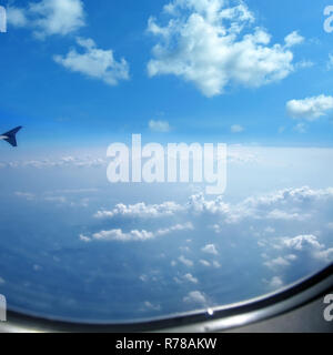 clouds from airplane window Stock Photo