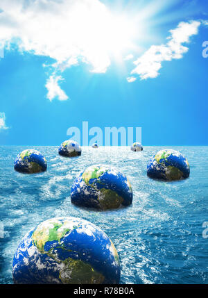 Globe floating on sea Stock Photo