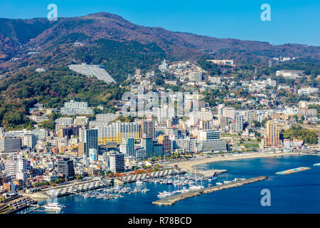 Atami, Shizuoka / Japan - December 1 2018: Aerial cityscape view of Atami beach and city centre, popular onsen leisure resort town in Autumn Stock Photo