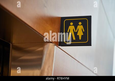 Toilet sign in a building Stock Photo